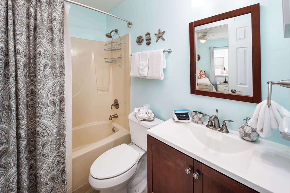 Second full size bathroom with shower/tub combo