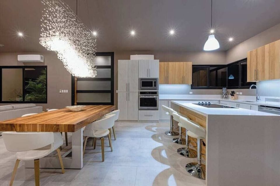 Clean lines of a modern equipped kitchen with Silestone quartz countertops 