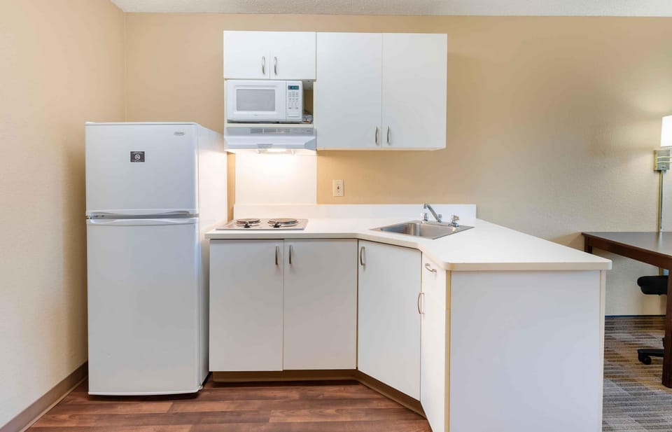 Studio, 1 King Bed, Non Smoking | Private kitchen | Coffee/tea maker, fridge, microwave, stovetop