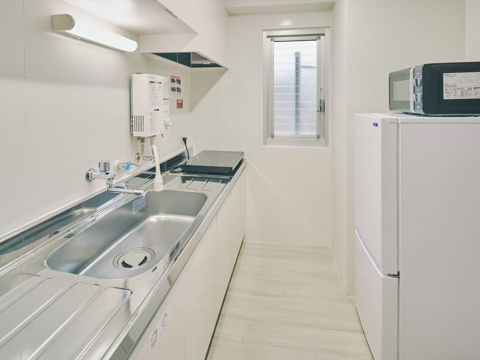 Apartment, Non Smoking | Private kitchen | Shared fridge, shared microwave, electric kettle