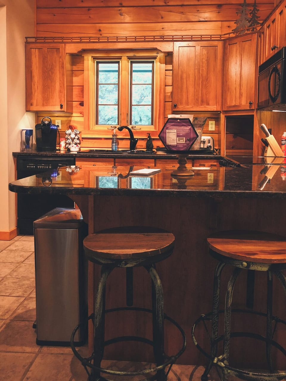 Kitchen w/Keurig coffee maker & a few pods provided for guests, and cookware 