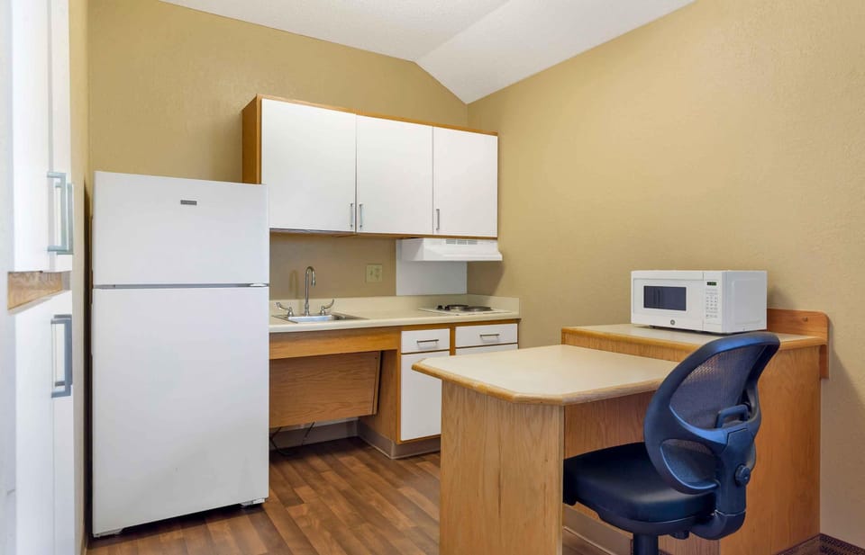 Deluxe Studio, 1 Queen Bed with Sofa bed, Accessible, Non Smoking | Private kitchen | Coffee/tea maker, full-size fridge, microwave, stovetop