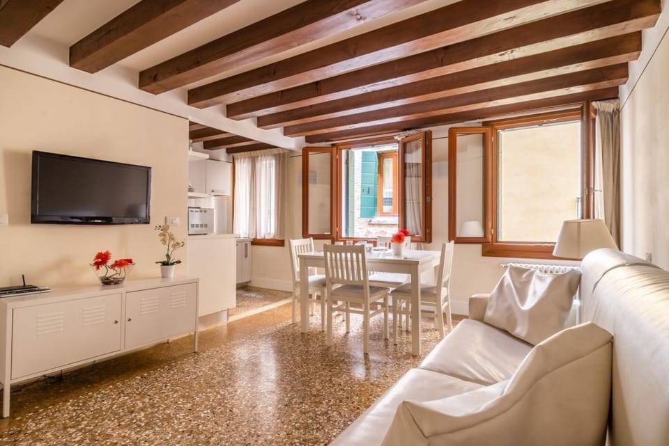 Apartment, 1 Bedroom | Living room | 21-inch flat-screen TV with digital channels, TV