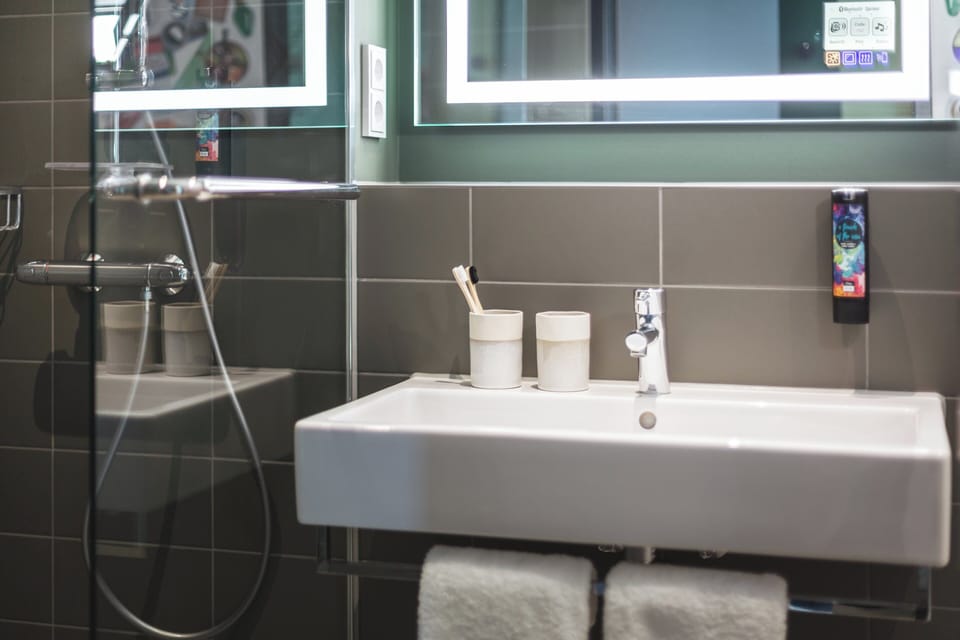 Hair dryer, towels, soap, shampoo