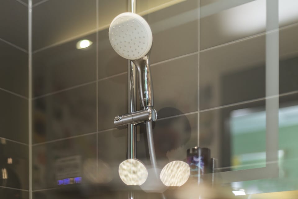 Hair dryer, towels, soap, shampoo