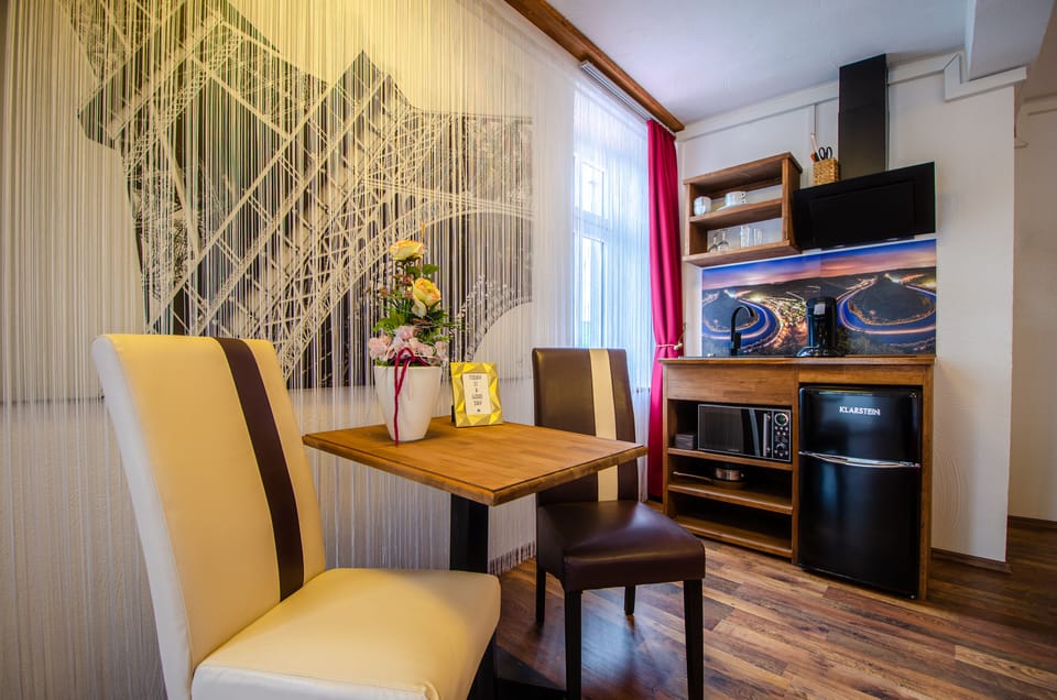 Studio (Haus Landsknecht - Erker Apartments) | Living area | 82-cm flat-screen TV with cable channels, TV