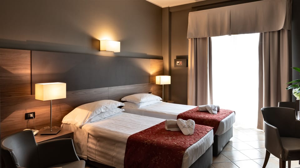 Standard Twin Room | Down comforters, minibar, in-room safe, WiFi (free)