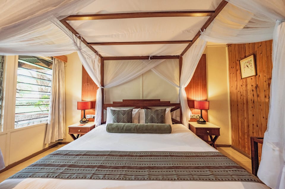 Presidential Cottage | Down comforters, memory foam beds, minibar, in-room safe