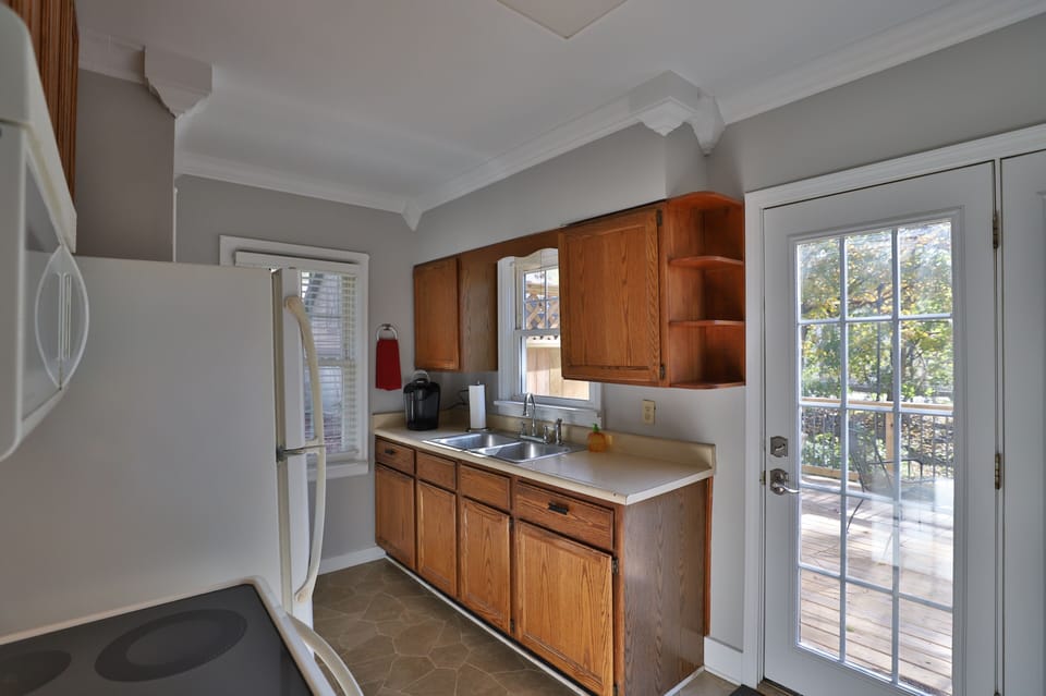 Eat in Kitchen with stove, refrigerator, and microwave. Perfect for long term!