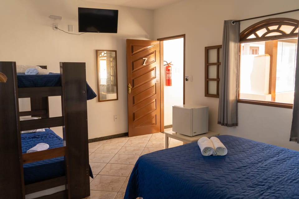 Suíte 7 | Blackout drapes, free WiFi, bed sheets
