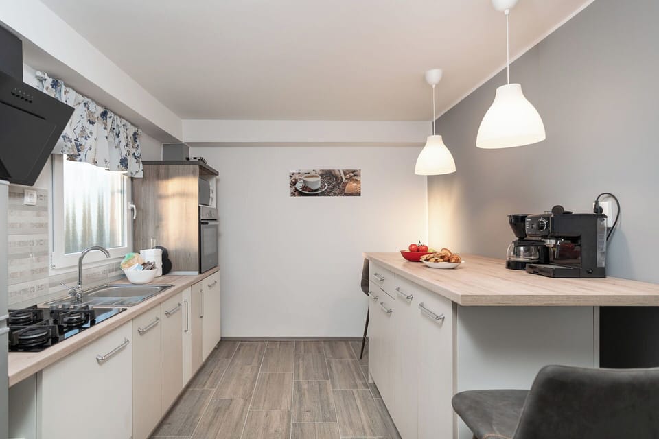 Villa | Private kitchen | Fridge, microwave, oven, stovetop