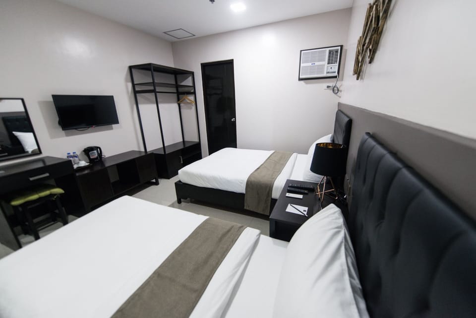 Executive Room | Desk, laptop workspace, blackout drapes, iron/ironing board (on request)