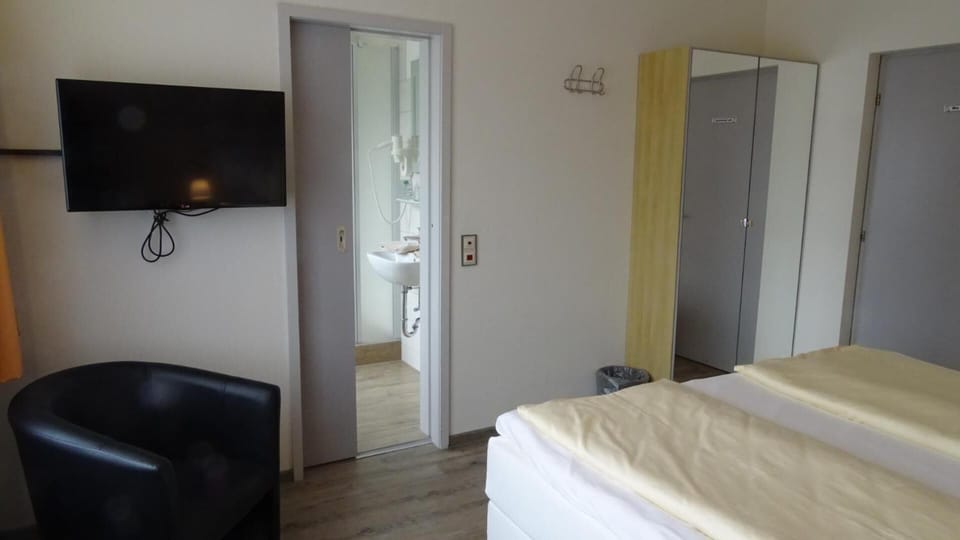 Premium bedding, blackout drapes, soundproofing, free WiFi