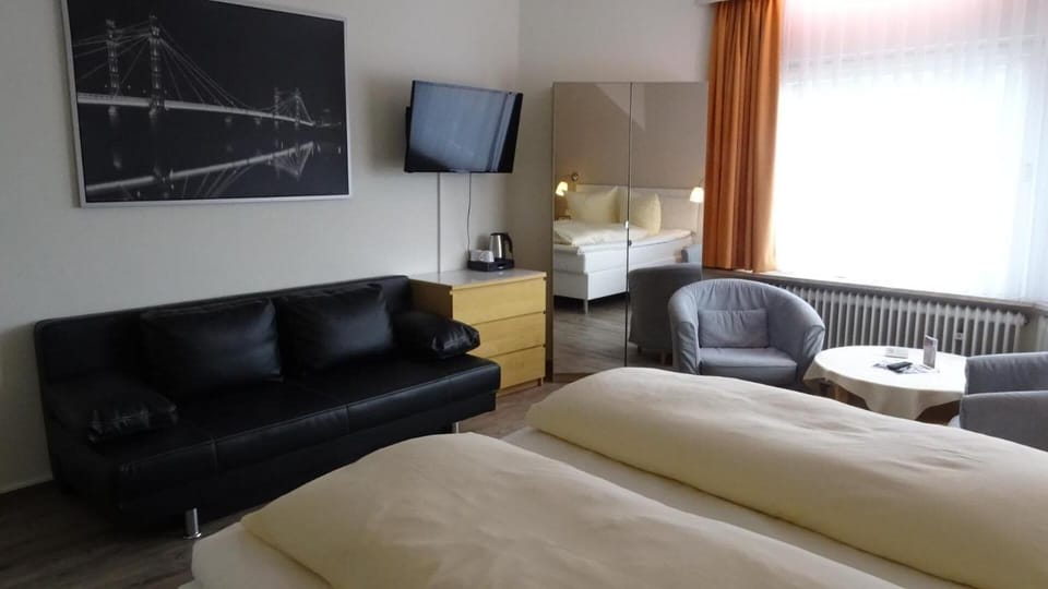 Premium bedding, blackout drapes, soundproofing, free WiFi