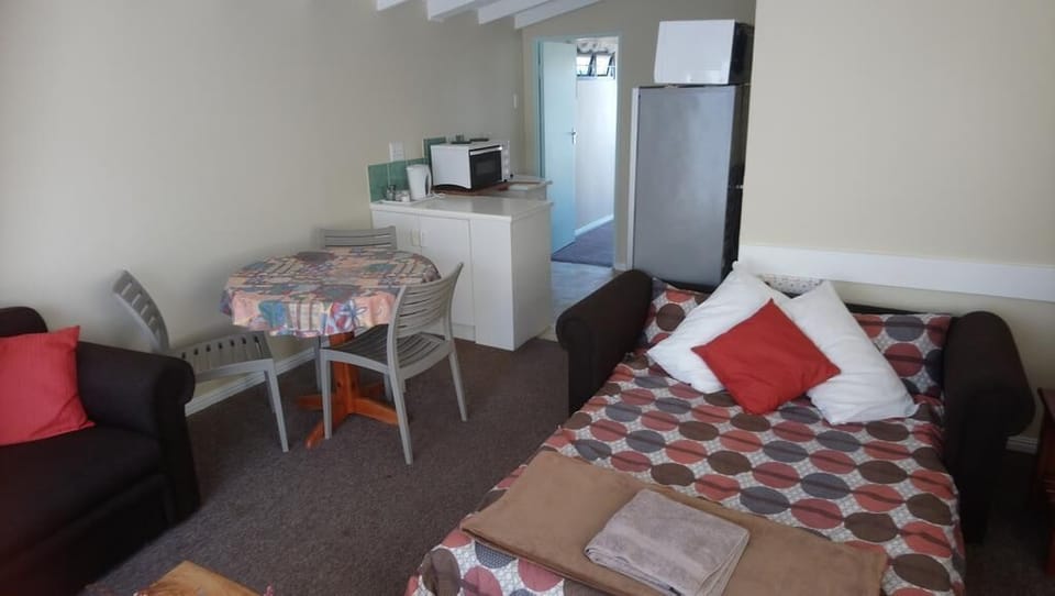 Comfort Loft | Living area | Flat-screen TV
