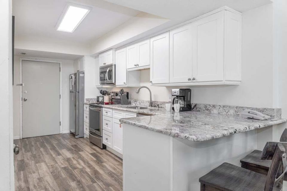 Condo, 2 Bedrooms | Private kitchen | Fridge, oven, coffee/tea maker, toaster