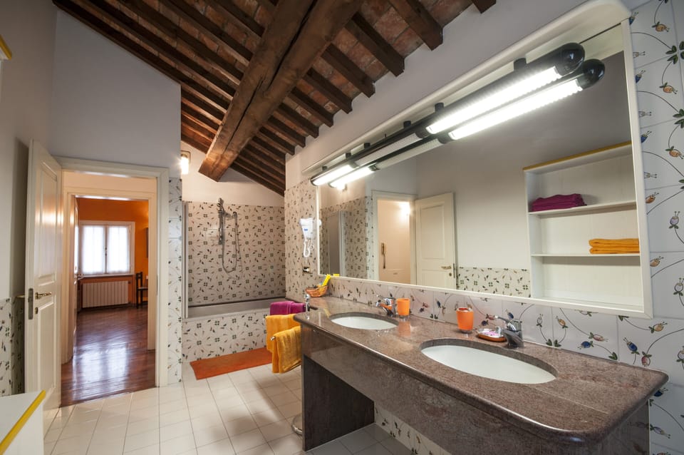 Suite, 2 Bedrooms, Garden View | Bathroom | Free toiletries, hair dryer, towels, toilet paper
