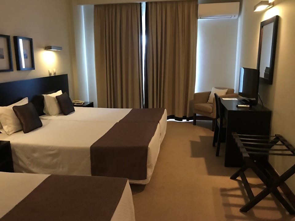 Down comforters, pillowtop beds, desk, soundproofing
