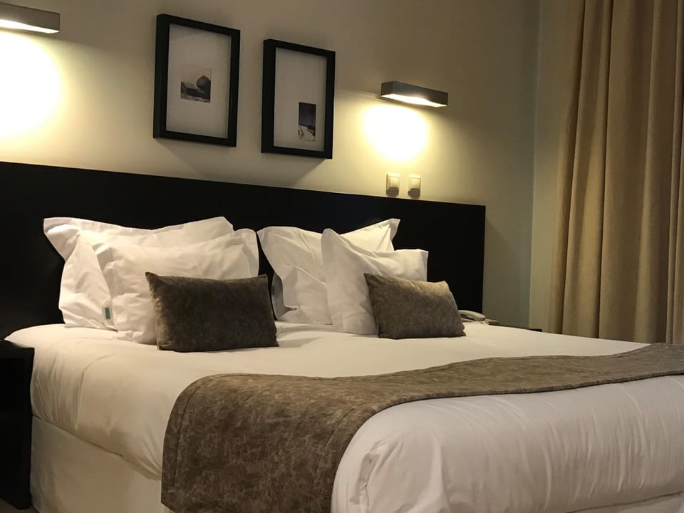 Down comforters, pillowtop beds, desk, soundproofing