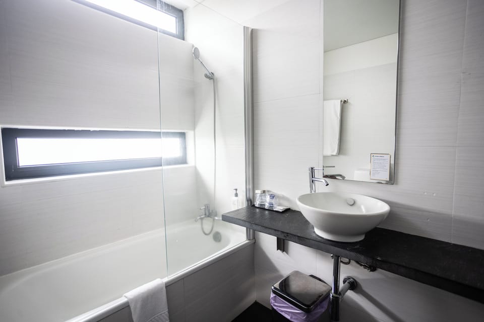 Hair dryer, towels, soap, shampoo