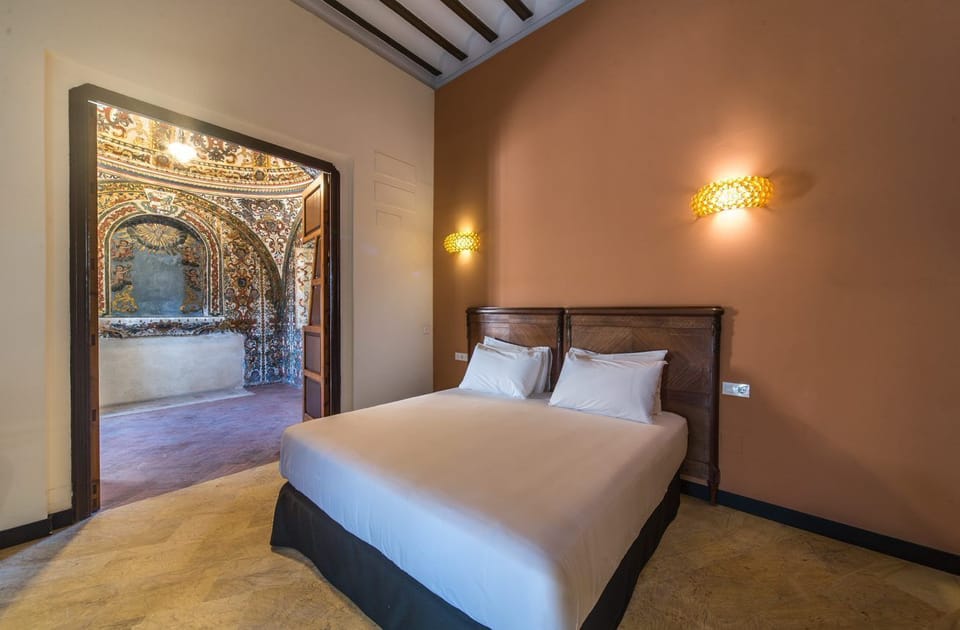 Superior Room | Minibar, in-room safe, individually decorated, desk