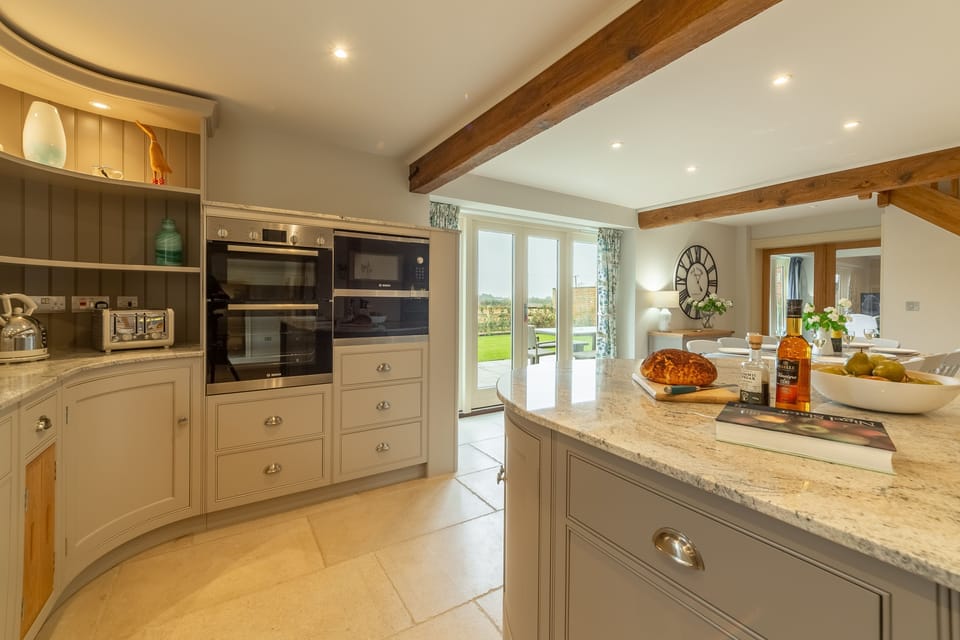 Ground floor: Kitchen is well-equipped and comes with granite work surfaces