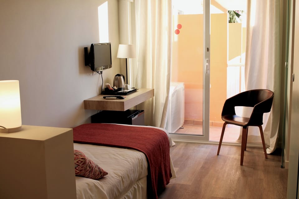 Classic Single Room, Terrace | Egyptian cotton sheets, down comforters, memory foam beds, in-room safe