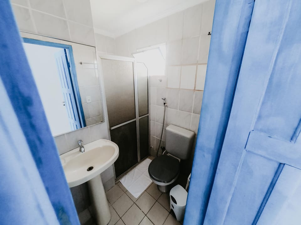 Shower, towels, soap, toilet paper