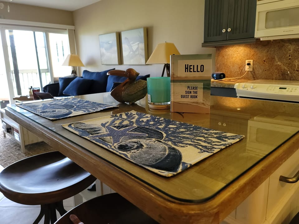 Fully stocked kitchen with movable island