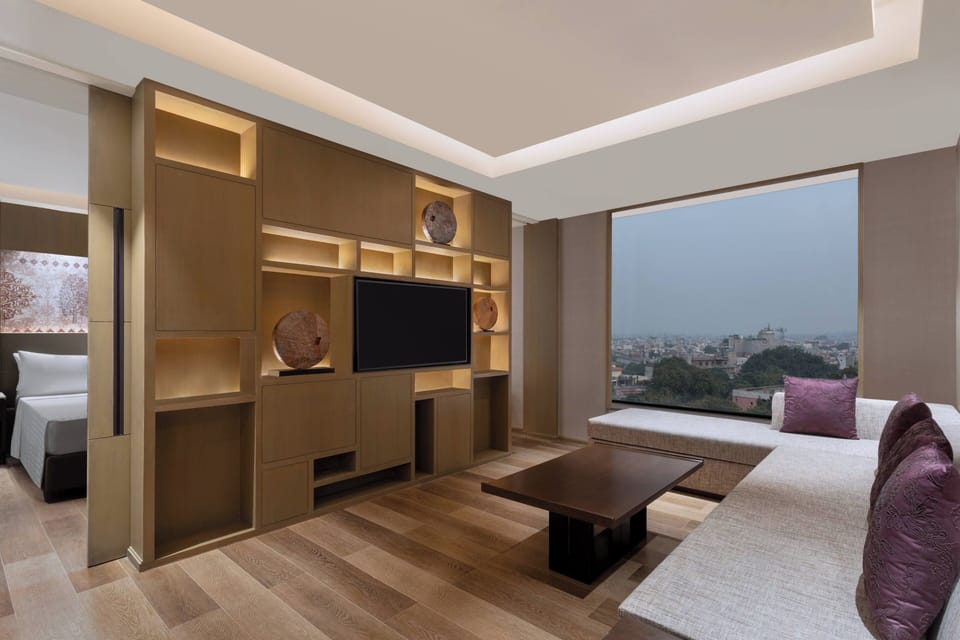 Room, 1 King Bed | Living area | 49-inch LED TV with digital channels, TV