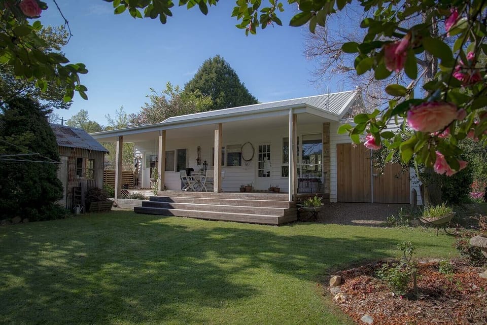 Spacious back deck steps into Norala Garden and on to the Ovens at back gate