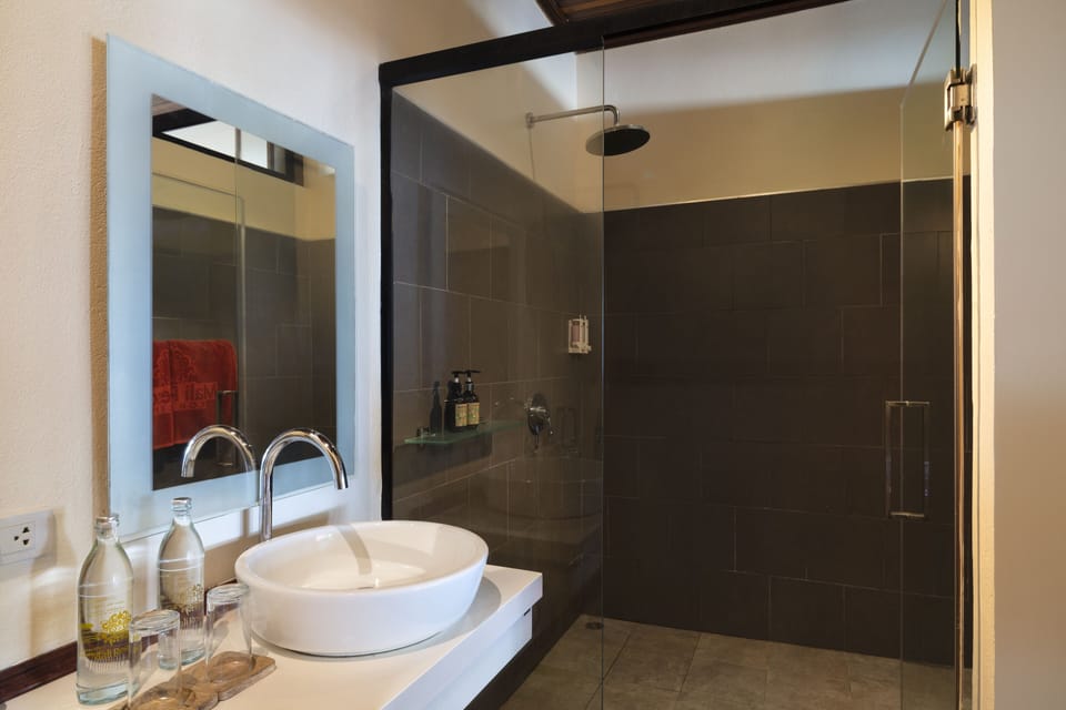 Beachfront Standard Room | Bathroom | Shower, free toiletries, towels, soap