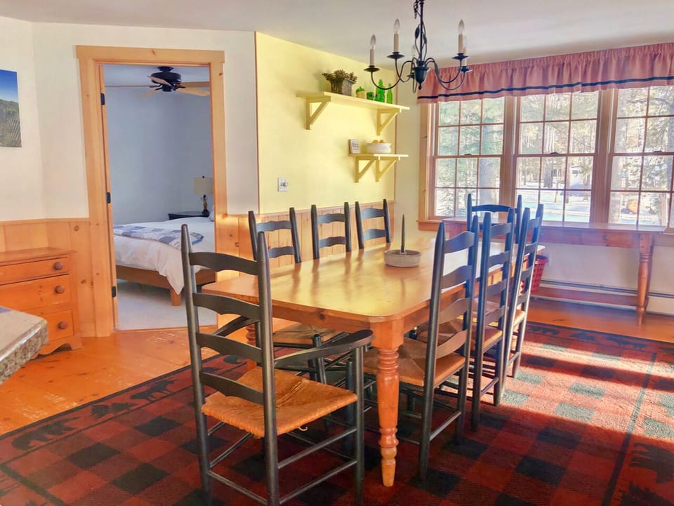 The beautiful dining table that seats 6 near the bonus room.