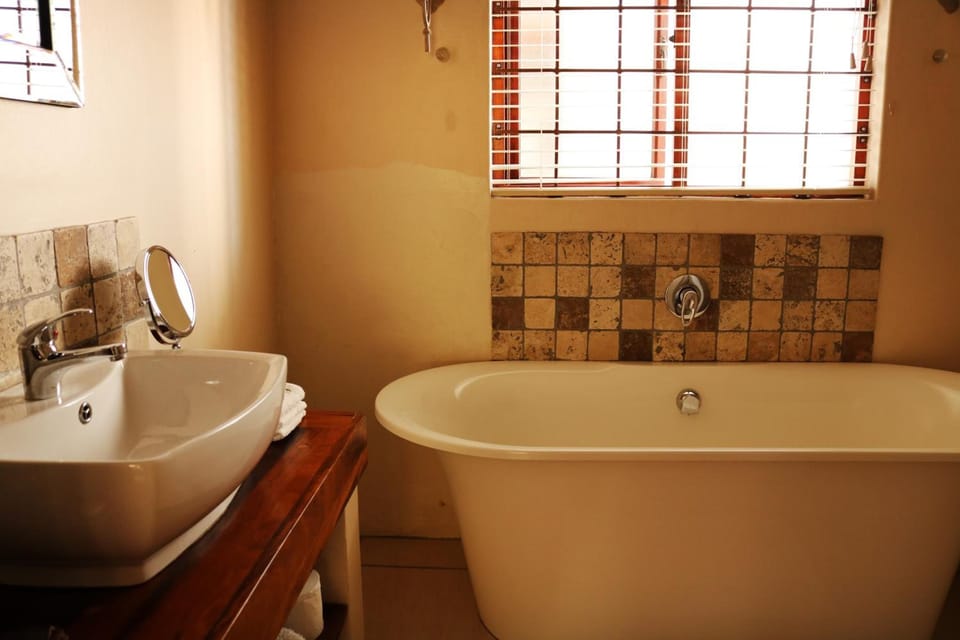 Rainfall showerhead, hair dryer, towels, soap
