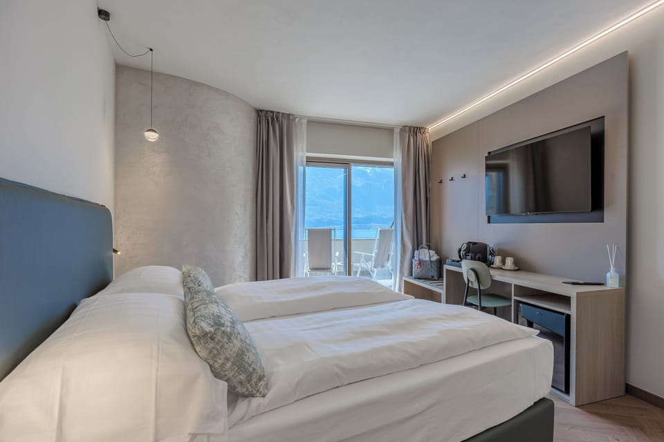 Camera Matrimoniale Panoramic Luxury, Vista Lago | In-room safe, free WiFi, bed sheets