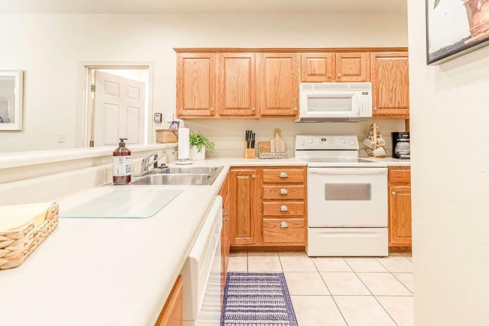 Kitchen equipped with full size Appliances.