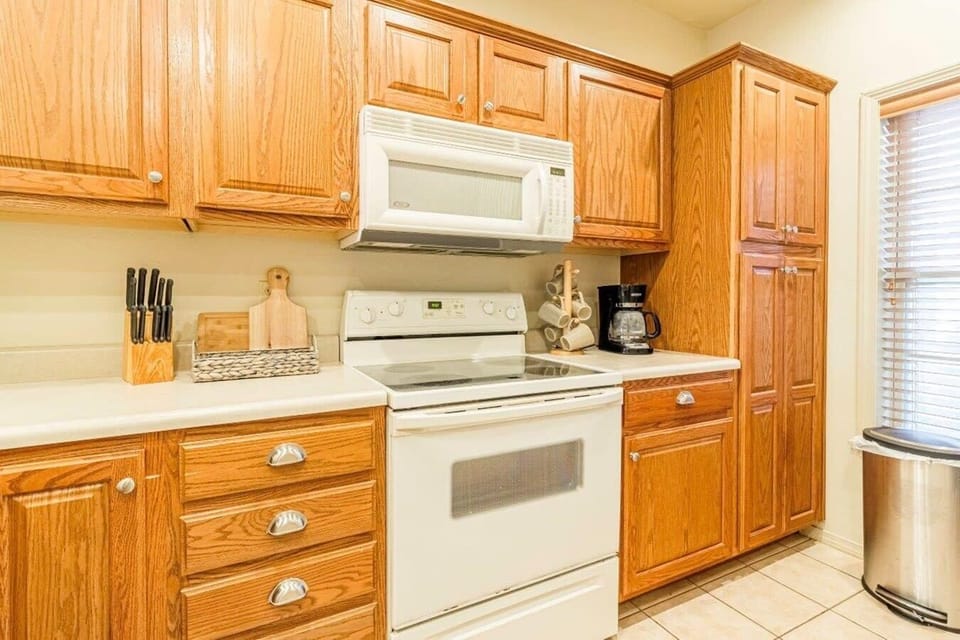 Kitchen equipped with full size Appliances.