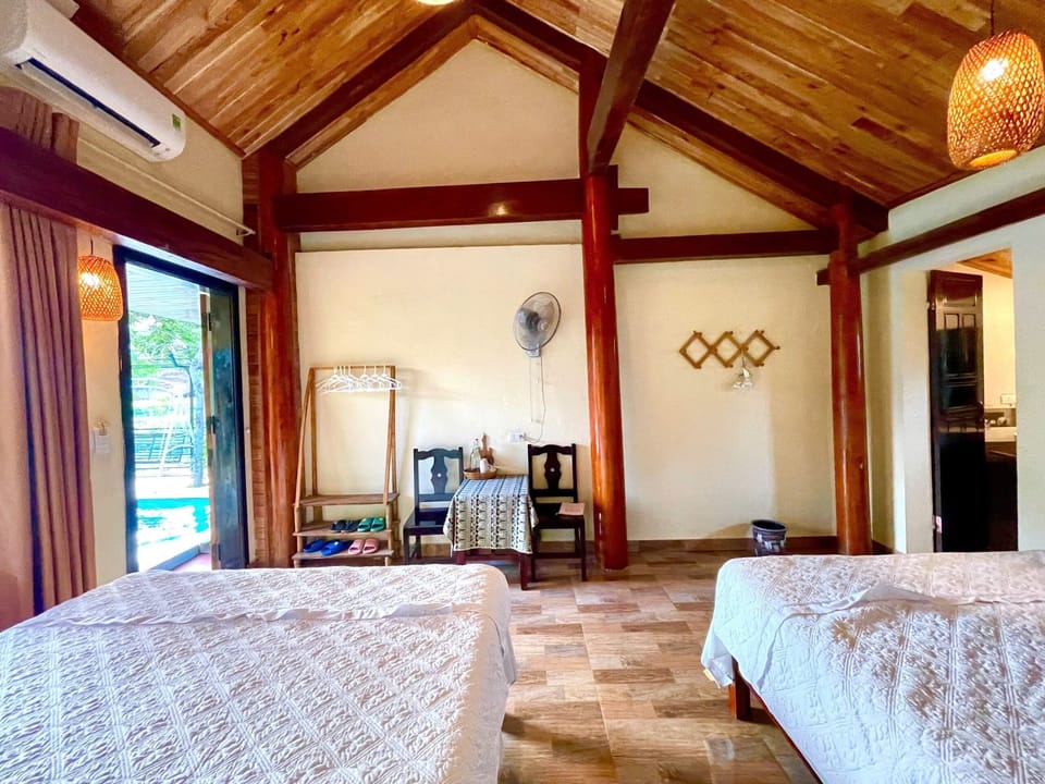 Family Room, Pool View | Individually decorated, individually furnished, desk, laptop workspace