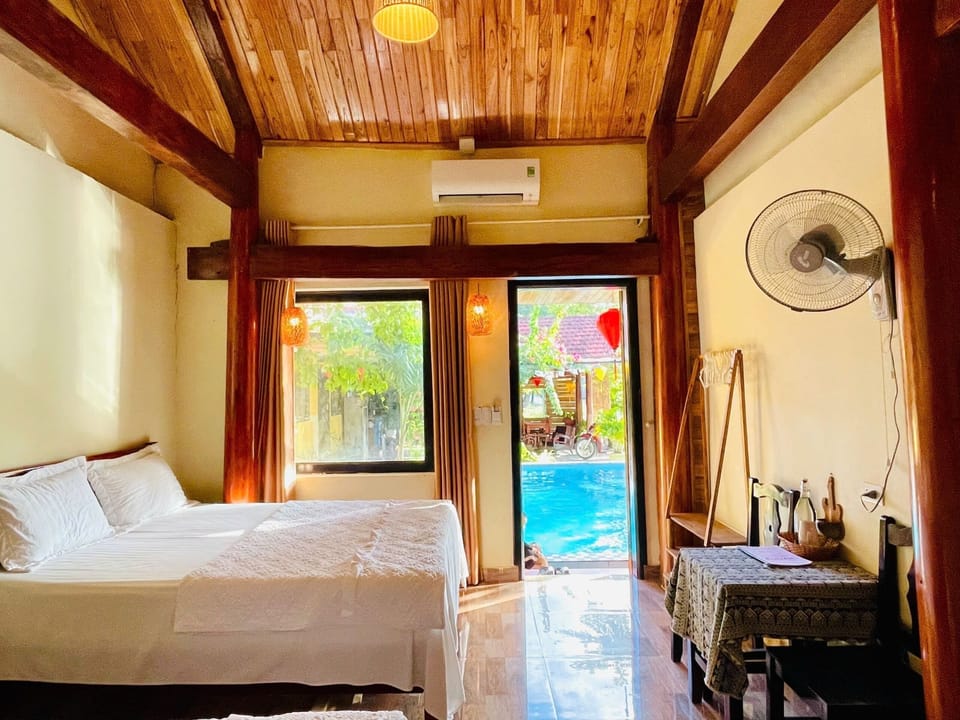 Family Room, Pool View | Individually decorated, individually furnished, desk, laptop workspace
