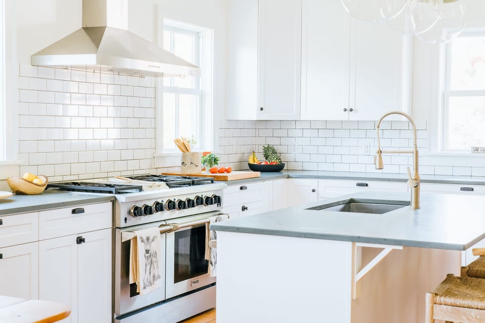 Chefs kitchen with new stainless steel appliances