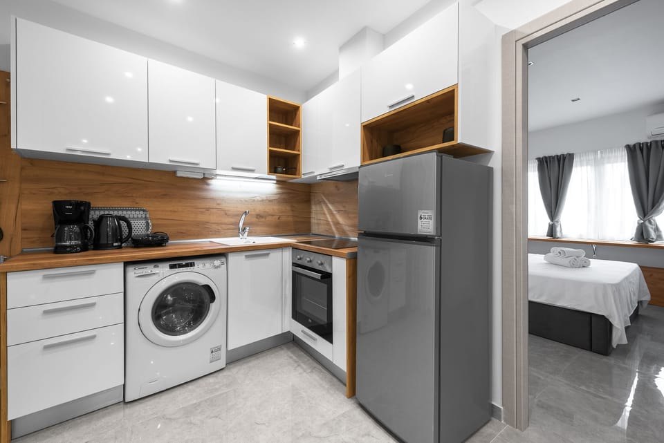 Apartment, 1 Bedroom | Private kitchen | Fridge, oven, stovetop, electric kettle
