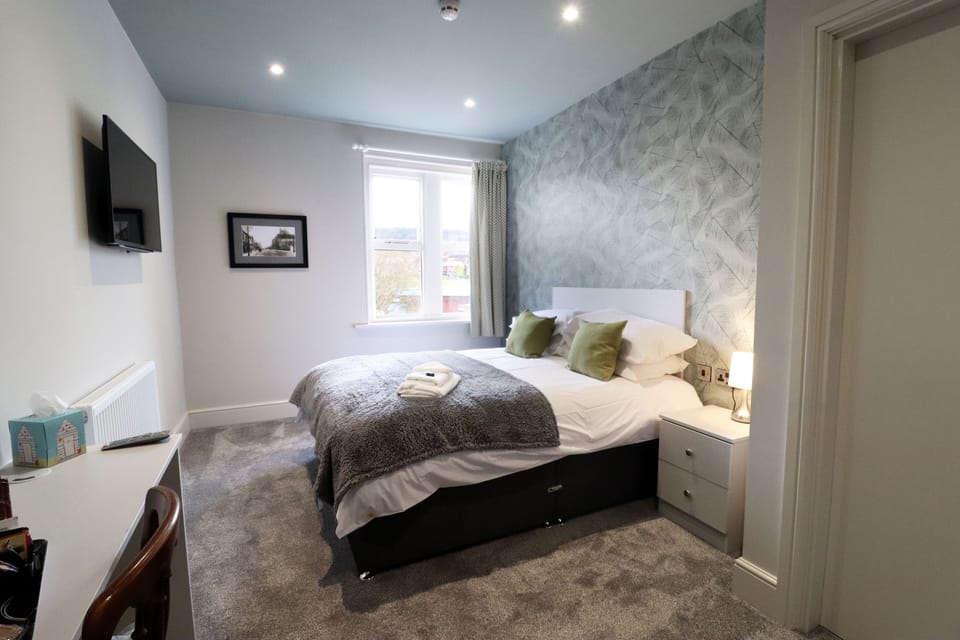In-room safe, desk, laptop workspace, iron/ironing board