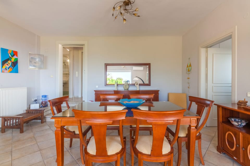 Villa | Living area | 42-inch flat-screen TV with satellite channels, TV