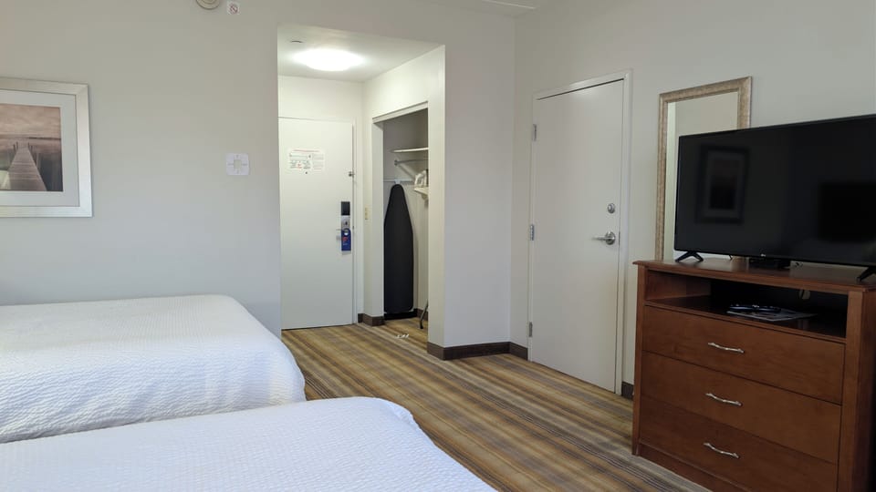 Room, 2 Double Beds | In-room safe, desk, laptop workspace, iron/ironing board