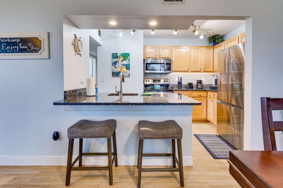 Check out the open renovated kitchen with oversized counter space