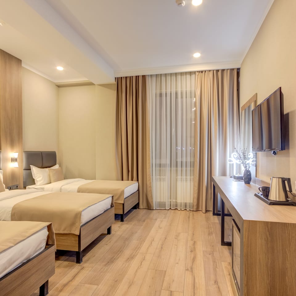 Standard Triple Room | Premium bedding, down comforters, minibar, desk
