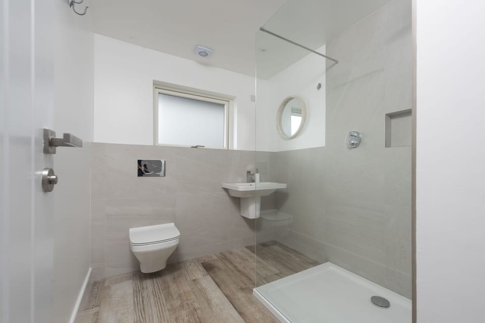 Family bathroom; super modern with top quality fittings incl. rainwater shower