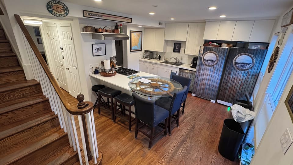 View of street from kitchen - blinds can give you as much privacy as you need.