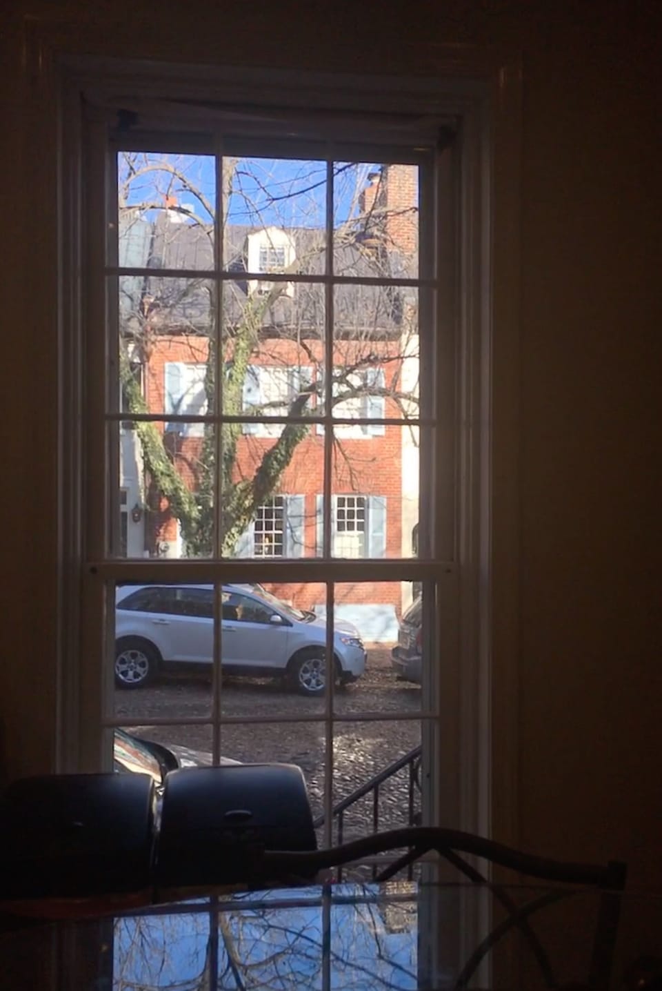 View of street from kitchen - blinds can give you are much privacy as you need.