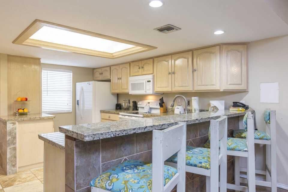 Show off your culinary skills while your guests lounge at the bar. 